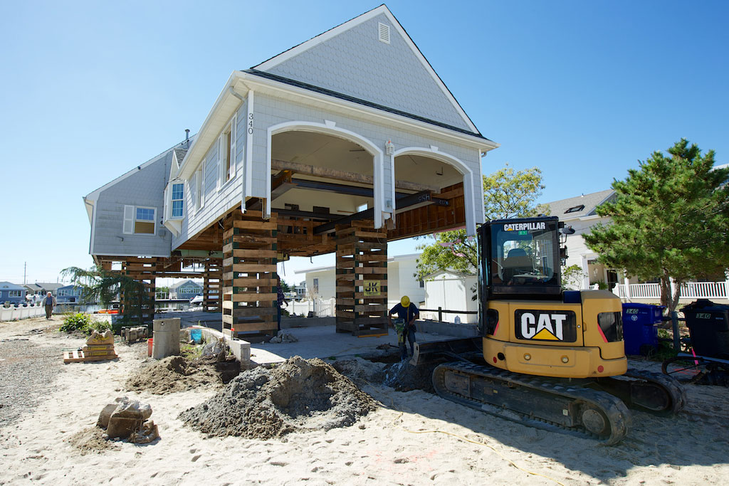 A Chadwick Beach house raised and ready for helical piles. Chadwick Beach, NJ. September, 2013.