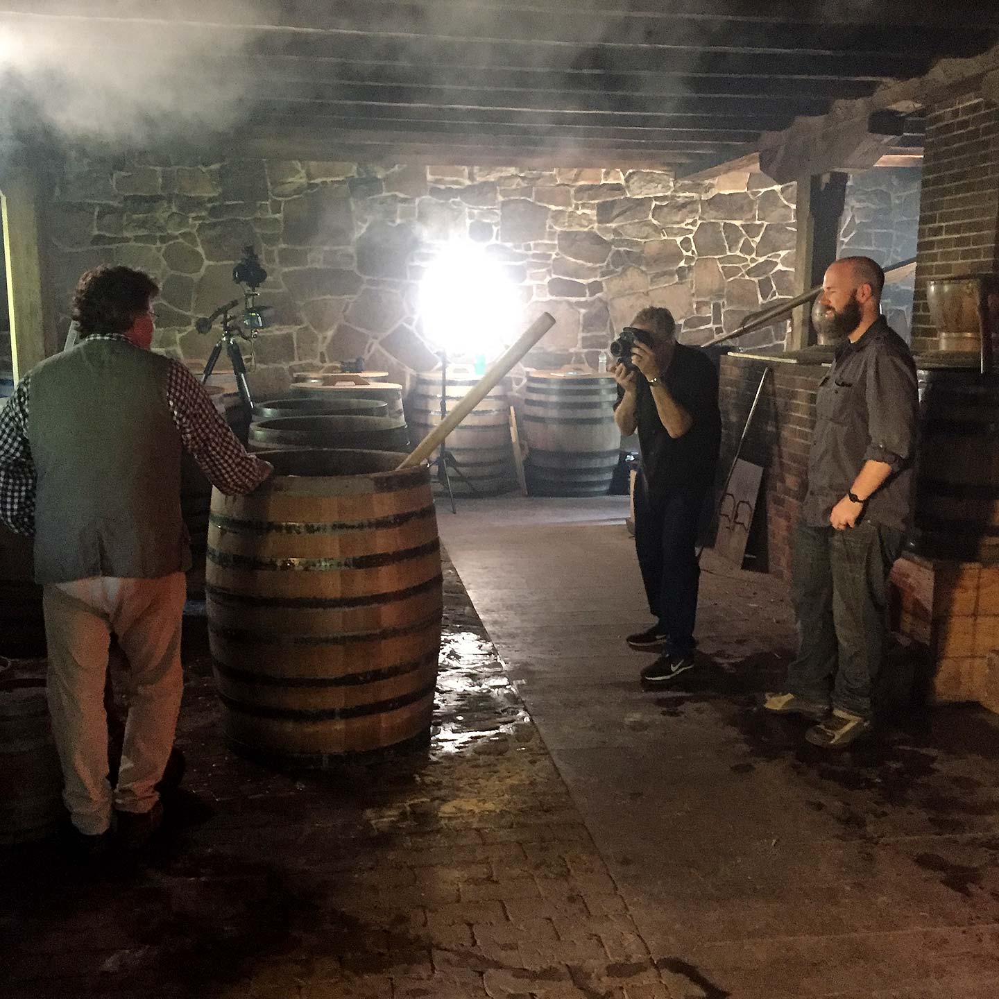 Cameron photographing in the Mount Vernon Distillery. Mount Vernon, VA. June, 2016.