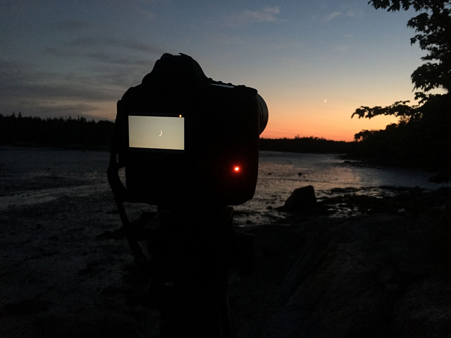 Filming the crescent moon in Fish Creek Cove. Canon 1DX Mark II with the Canon 100-400 F/4.5-5.6 L IS II Lens. September, 2016.