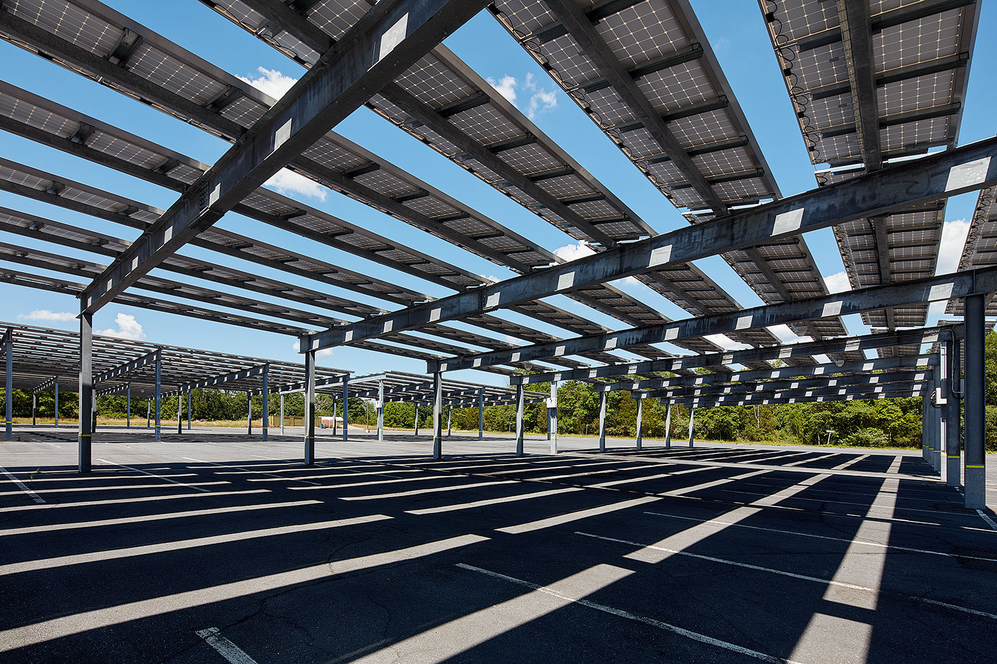 Solar arrays in a commuter parking lot provide shade and energy at Raritan Valley Community College. Branchburg, NJ. June, 2016.